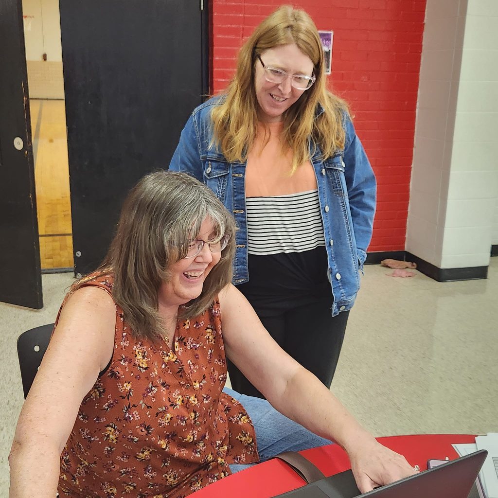 DCI consultant Jen Campbell working with a teacher.