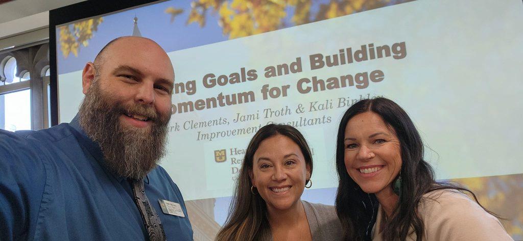 Custom PD Consultants posing for a selfie.