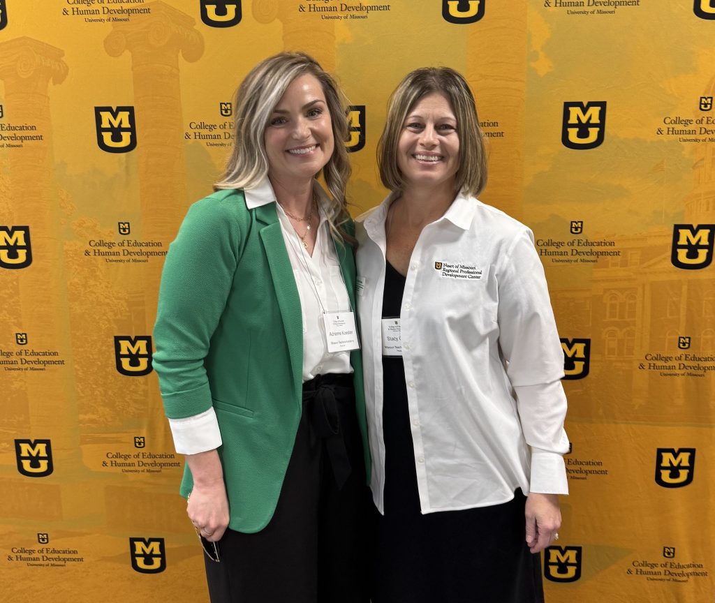 MTDS Consultant Stacy Quinn posing with Teacher Academy participant.